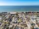 Aerial view of a house near the beach and ocean at 255 146Th Ave E, Madeira Beach, FL 33708