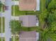 Aerial view showing house, yard, and neighborhood surroundings at 30009 Morningmist Dr, Wesley Chapel, FL 33543