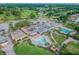 Clubhouse with pool and surrounding landscape at 3636 Trophy Blvd # 3636, New Port Richey, FL 34655