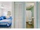 Small bathroom with a toilet, shower, and gray vanity at 3636 Trophy Blvd # 3636, New Port Richey, FL 34655