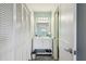 Clean bathroom with vanity, mirror, and storage at 3636 Trophy Blvd # 3636, New Port Richey, FL 34655