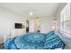 Main bedroom with a view of the bathroom and closet at 3636 Trophy Blvd # 3636, New Port Richey, FL 34655
