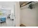 White closet with built in shelves and hanging space at 3636 Trophy Blvd # 3636, New Port Richey, FL 34655