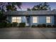 Charming condo with lit windows, landscaping and sidewalk at 3636 Trophy Blvd # 3636, New Port Richey, FL 34655