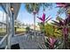 View of exterior showing patio and surrounding landscape at 3636 Trophy Blvd # 3636, New Port Richey, FL 34655