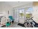 Sunroom with desk, seating, and view of the outdoors at 3636 Trophy Blvd # 3636, New Port Richey, FL 34655