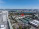 Aerial view of condo building and tennis courts near the water at 501 Knights Run Ave # 2308, Tampa, FL 33602
