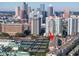 Condo building with city skyline view and tennis courts at 501 Knights Run Ave # 2308, Tampa, FL 33602