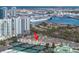Condo building with city skyline view and nearby tennis courts at 501 Knights Run Ave # 2308, Tampa, FL 33602
