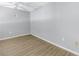 Empty bedroom with gray walls and wood floor at 501 Knights Run Ave # 2308, Tampa, FL 33602