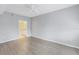 Bright bedroom with ceiling fan and wood-look floors at 501 Knights Run Ave # 2308, Tampa, FL 33602