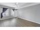 Bright bedroom with wood floors and private access to balcony at 501 Knights Run Ave # 2308, Tampa, FL 33602