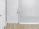 Front door entry with wood-look flooring at 501 Knights Run Ave # 2308, Tampa, FL 33602
