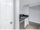 Modern kitchen with stainless steel appliances and white cabinets at 501 Knights Run Ave # 2308, Tampa, FL 33602