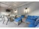 Outdoor patio area with seating, a TV, and modern furniture at 501 Knights Run Ave # 2308, Tampa, FL 33602