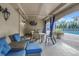 Relaxing patio area with seating and pool view at 501 Knights Run Ave # 2308, Tampa, FL 33602