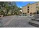 Community pool with plenty of lounge chairs at 501 Knights Run Ave # 2308, Tampa, FL 33602