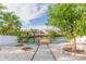 Backyard oasis with a private dock, lush landscaping, and serene canal views at 6512 Manila Palm Way, Apollo Beach, FL 33572