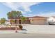 One-story home with attached garage and a red tile roof on a corner lot at 6512 Manila Palm Way, Apollo Beach, FL 33572