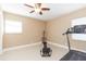 Home gym with treadmill and weight machine at 6512 Manila Palm Way, Apollo Beach, FL 33572