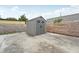 Gray plastic storage shed in backyard at 7402 Sherren Dr, Tampa, FL 33619