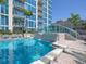 Inviting pool with water feature at 777 N Ashley Dr # 2210, Tampa, FL 33602