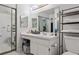 Bathroom features vanity, toilet, and mirrored medicine cabinet at 7901 Sugarcane Ct, Temple Terrace, FL 33637