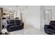 View of living room and hallway, showing tiled floors at 7901 Sugarcane Ct, Temple Terrace, FL 33637