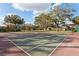 Two well-maintained tennis courts at 7901 Sugarcane Ct, Temple Terrace, FL 33637