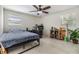 Spacious bedroom with a double bed and ceiling fan at 8820 52Nd N St, Pinellas Park, FL 33782