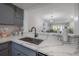 Modern kitchen with a breakfast bar and stylish finishes at 90 S Highland Ave # 416, Tarpon Springs, FL 34689