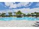 Resort-style pool with lounge chairs at 10336 Cross River Trl, Parrish, FL 34219