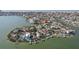 Aerial close up of house on a waterfront property at 15825 Redington Dr, Redington Beach, FL 33708