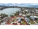 Aerial view of waterfront home with large lot and surrounding houses at 15825 Redington Dr, Redington Beach, FL 33708