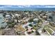 Aerial view of a single-Gathering home on a waterfront lot at 15825 Redington Dr, Redington Beach, FL 33708