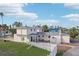 Aerial view of a waterfront home with a large backyard and pool at 15825 Redington Dr, Redington Beach, FL 33708