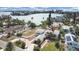 Aerial view showcasing a home's roofline and its waterfront location at 15825 Redington Dr, Redington Beach, FL 33708