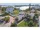 Property's waterfront location and landscaping are highlighted in this aerial view at 15825 Redington Dr, Redington Beach, FL 33708