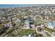 Aerial view of waterfront home with private dock and expansive views at 15825 Redington Dr, Redington Beach, FL 33708