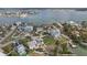 Aerial view of waterfront property in a residential area at 15825 Redington Dr, Redington Beach, FL 33708