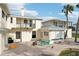 Spacious patio adjacent to the pool and house at 15825 Redington Dr, Redington Beach, FL 33708
