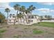 Large kidney-shaped pool and patio area at 15825 Redington Dr, Redington Beach, FL 33708
