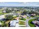 Aerial view of house and surrounding neighborhood with lush greenery at 1701 62Nd S Ter, St Petersburg, FL 33712