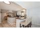 Modern kitchen with granite countertops and light cabinets at 233 Tarpon Ln, Oldsmar, FL 34677