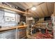 Workshop with workbench, shelving, and various tools and supplies at 233 Tarpon Ln, Oldsmar, FL 34677