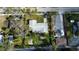 Aerial view of a house and surrounding properties at 336 Shaddock St, Tarpon Springs, FL 34689