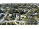 Aerial view of neighborhood, featuring houses and tree-lined streets at 336 Shaddock St, Tarpon Springs, FL 34689