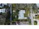 Aerial view of a house with backyard and surrounding landscape at 336 Shaddock St, Tarpon Springs, FL 34689