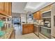 Well-equipped kitchen with granite countertops at 4621 Gulf Of Mexico Dr # D10, Longboat Key, FL 34228