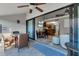 Balcony view into the living space and kitchen with dining space at 4621 Gulf Of Mexico Dr # D10, Longboat Key, FL 34228